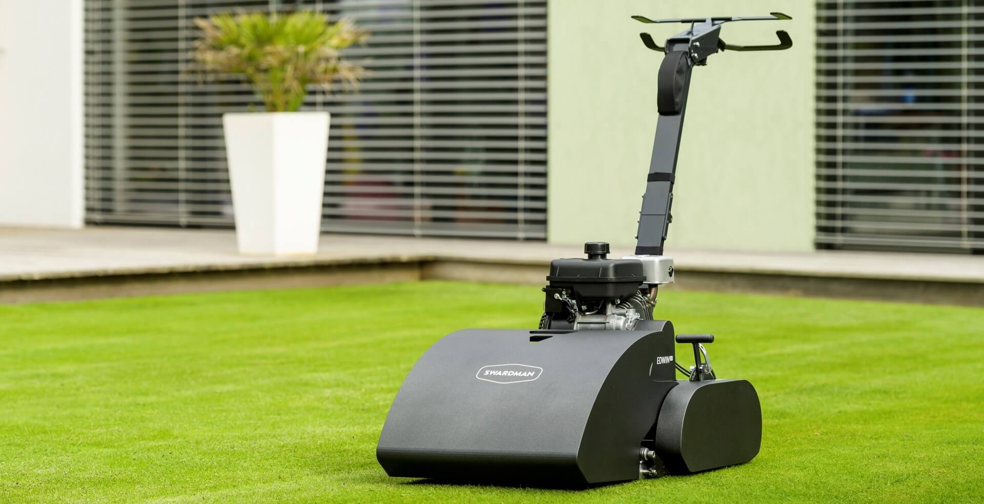 Swardman Edwin 2.1 cylinder mower on a lawn